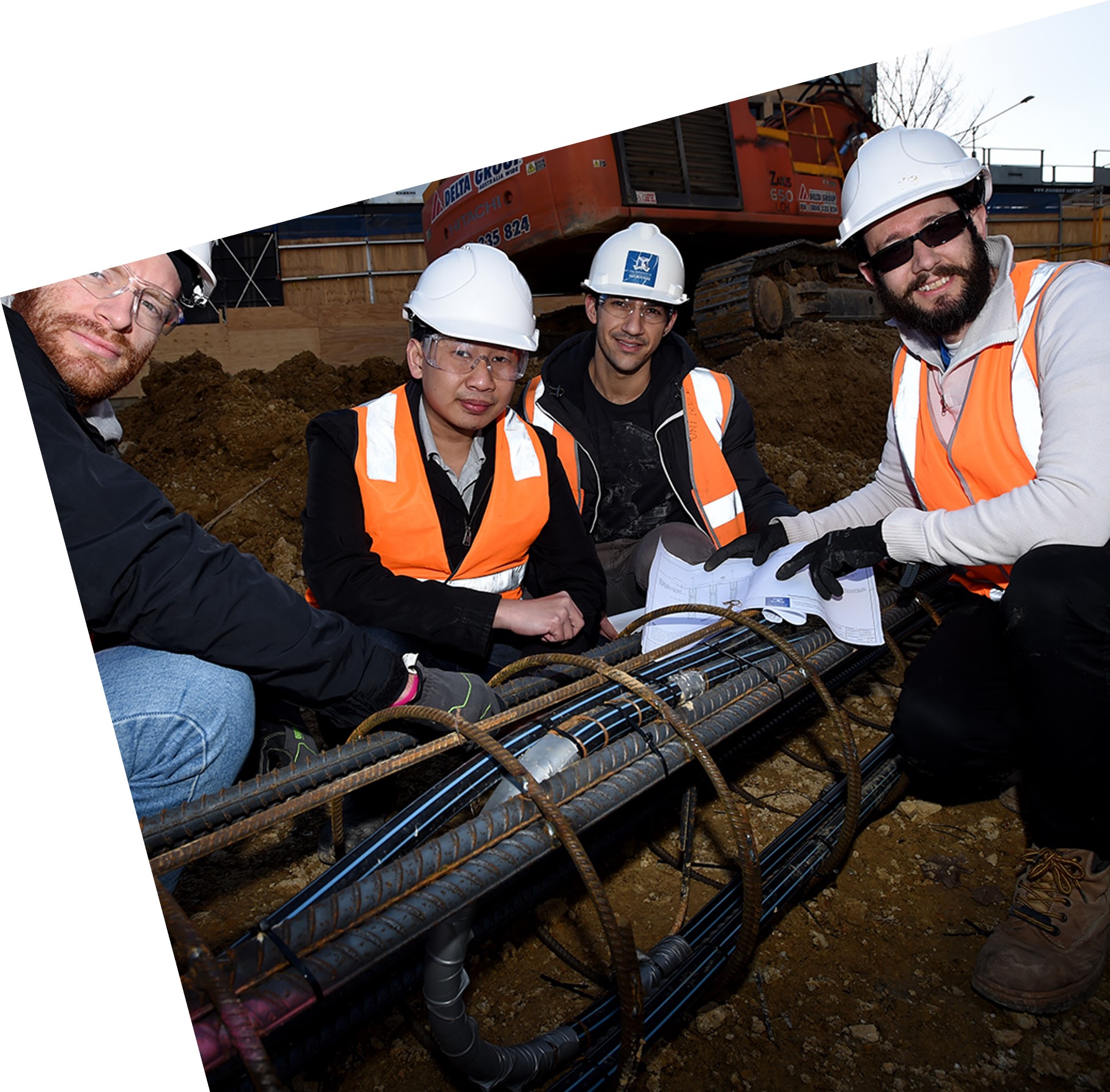 4EE team inspecting energy pile installation on construction site